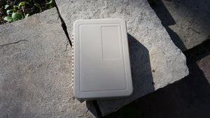 Plastic fly box filled with streamers