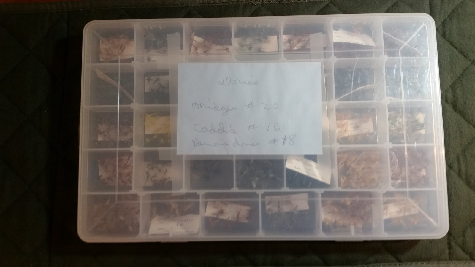 Plano fly box with collection of flies (dry flies) 