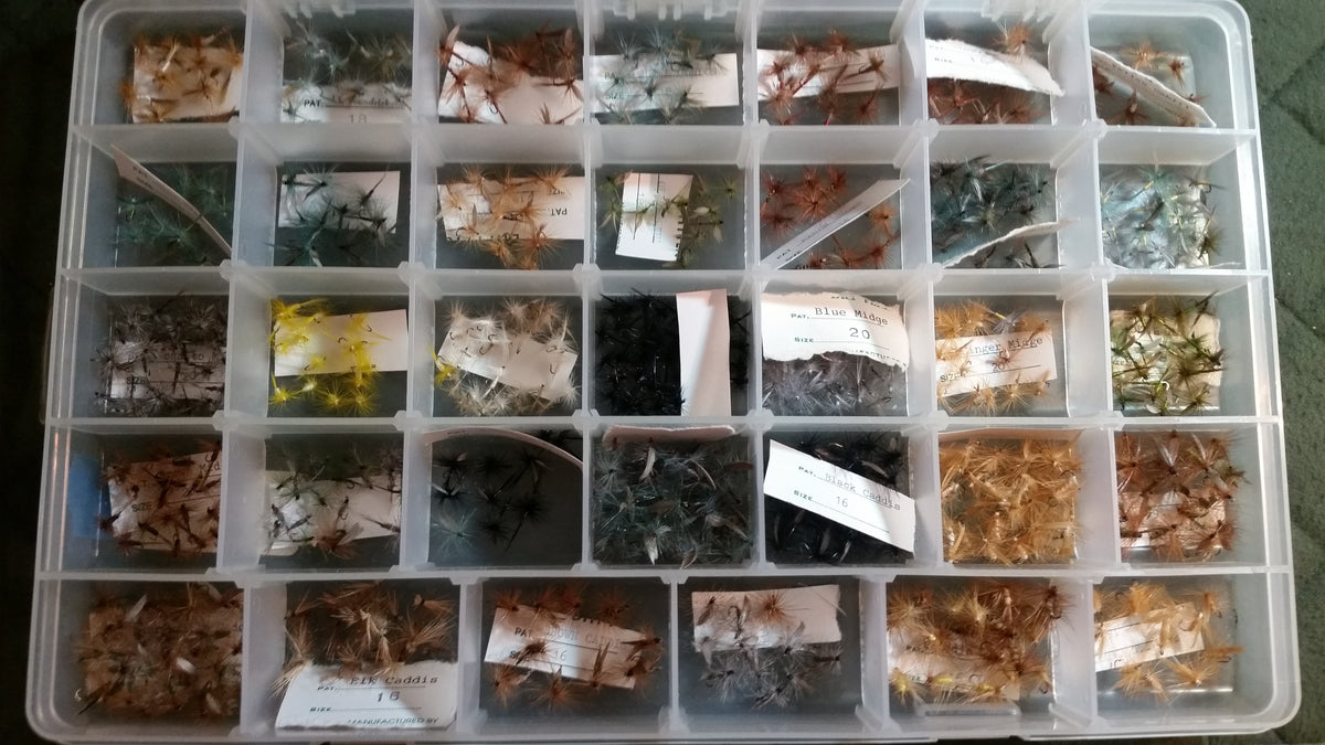Plano fly box with collection of flies (dry flies) 
