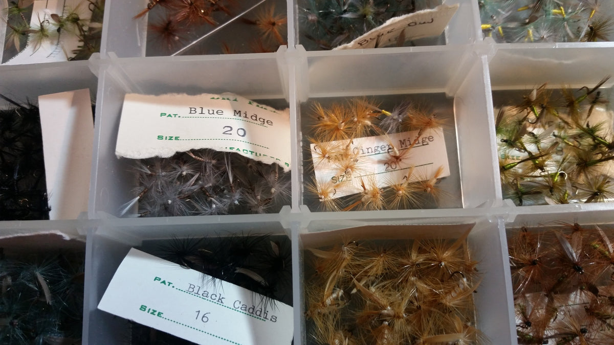 Plano fly box with collection of flies (dry flies) 