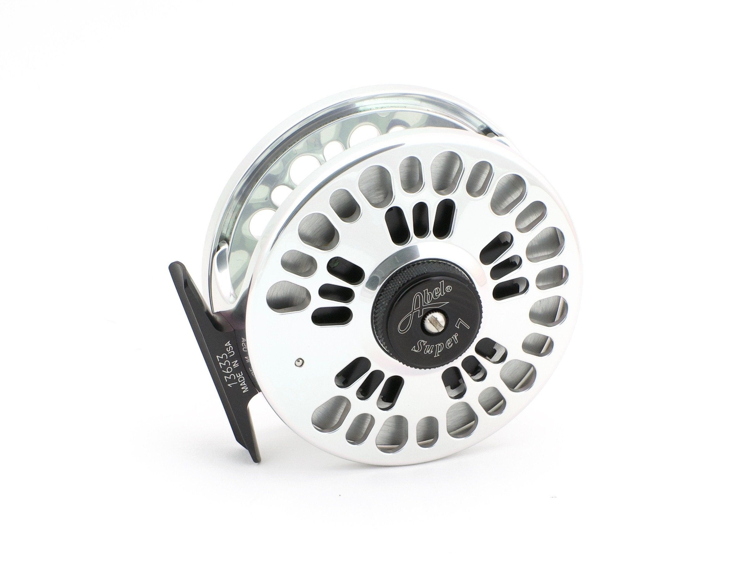 abel fly reel 3227 Creek #2 large arbor spool for single or two handed rods Structurally integral machining design to withstand the demands of the traveling angler Laser engraved fresh and saltwater flies on reverse side of drag plate that rotate as line is being retrieved Quick change spool Double pawl engagement on all sizes User convertible drag system Made in USA Available in March Abel TR Custom Classic Brook