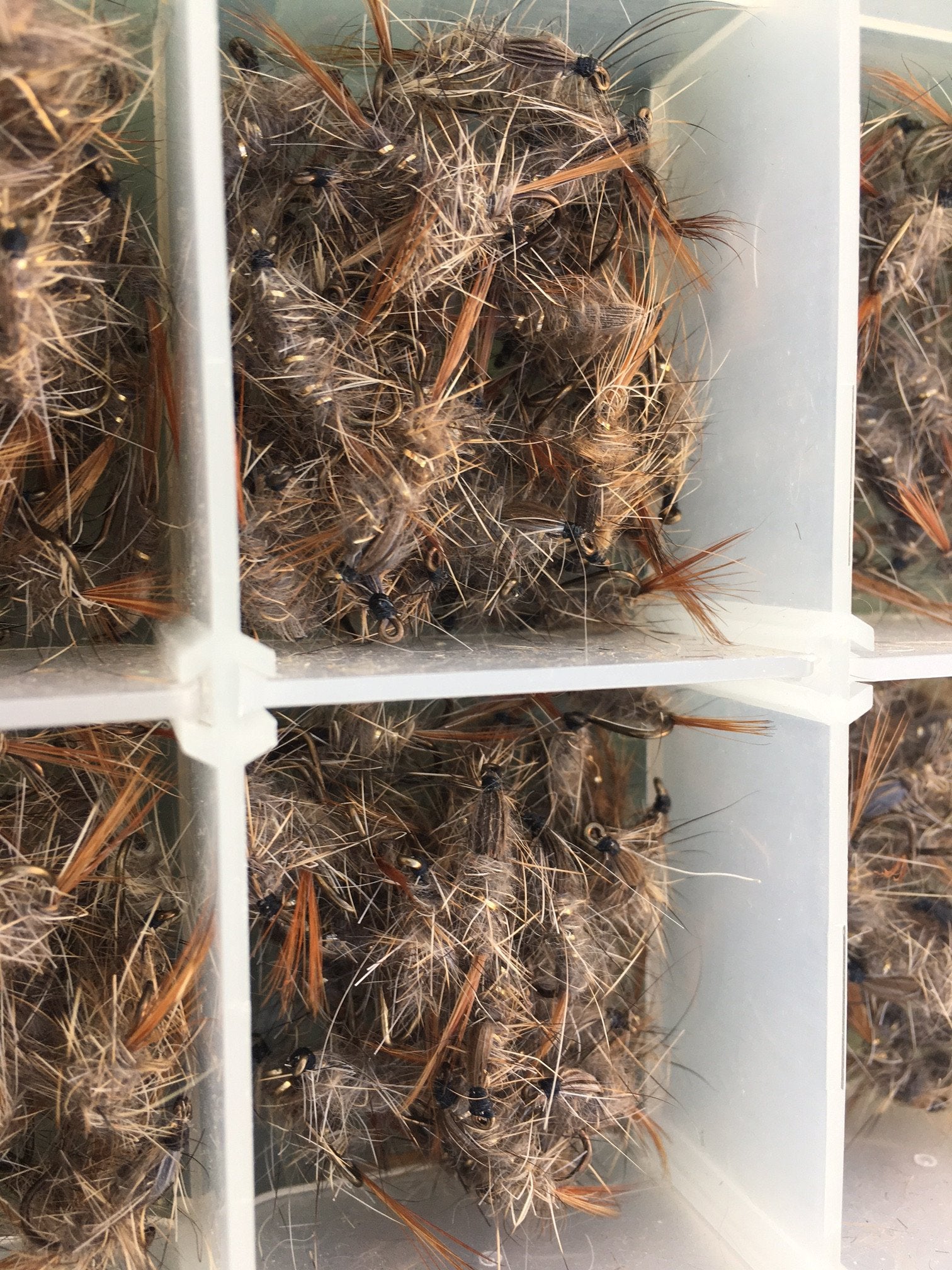 Plano fly box full of flies (nymphs and soft hackles) 