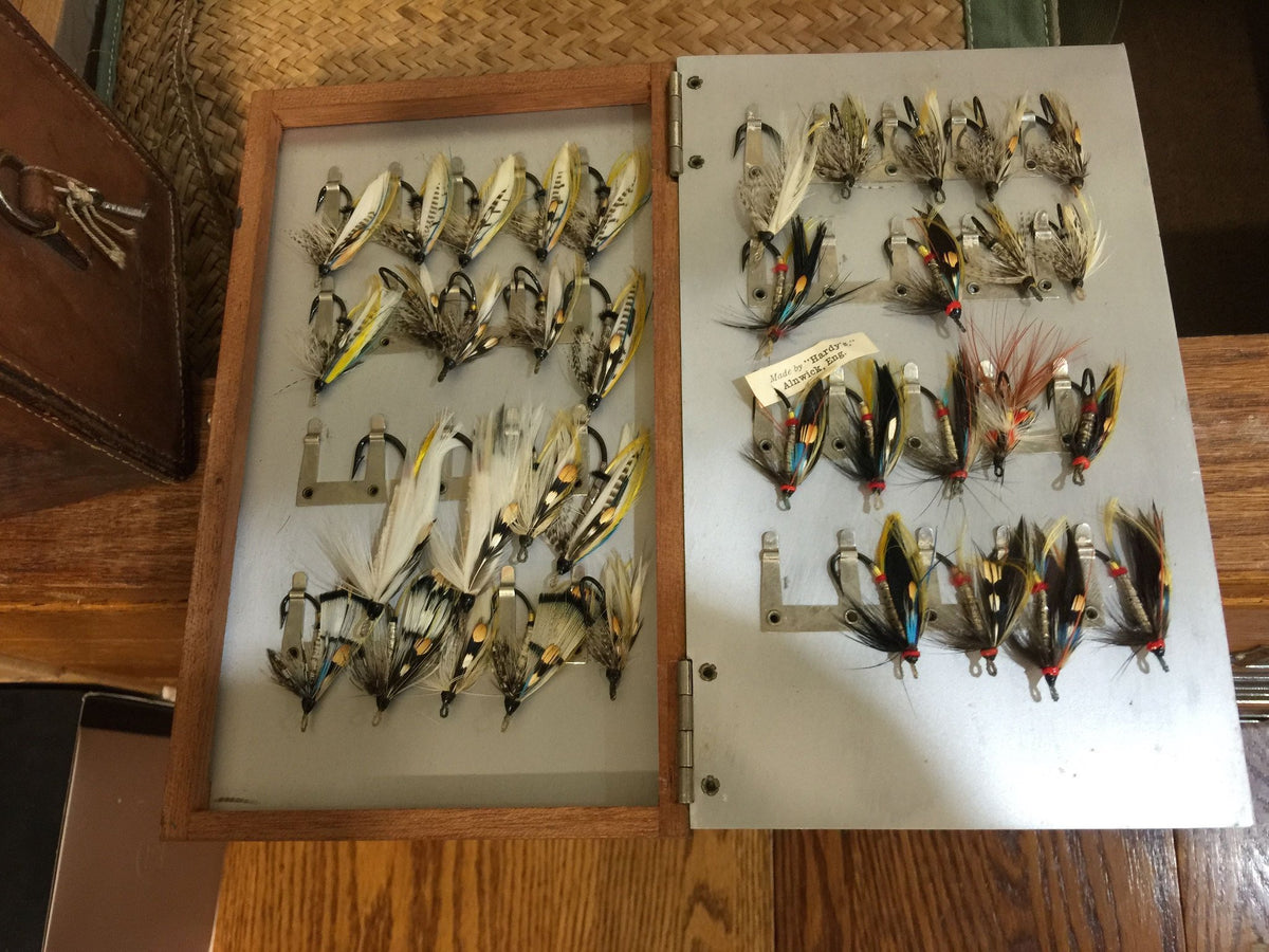 Abercrombie & Fitch leather salmon fly case with 150 unused salmon flies 