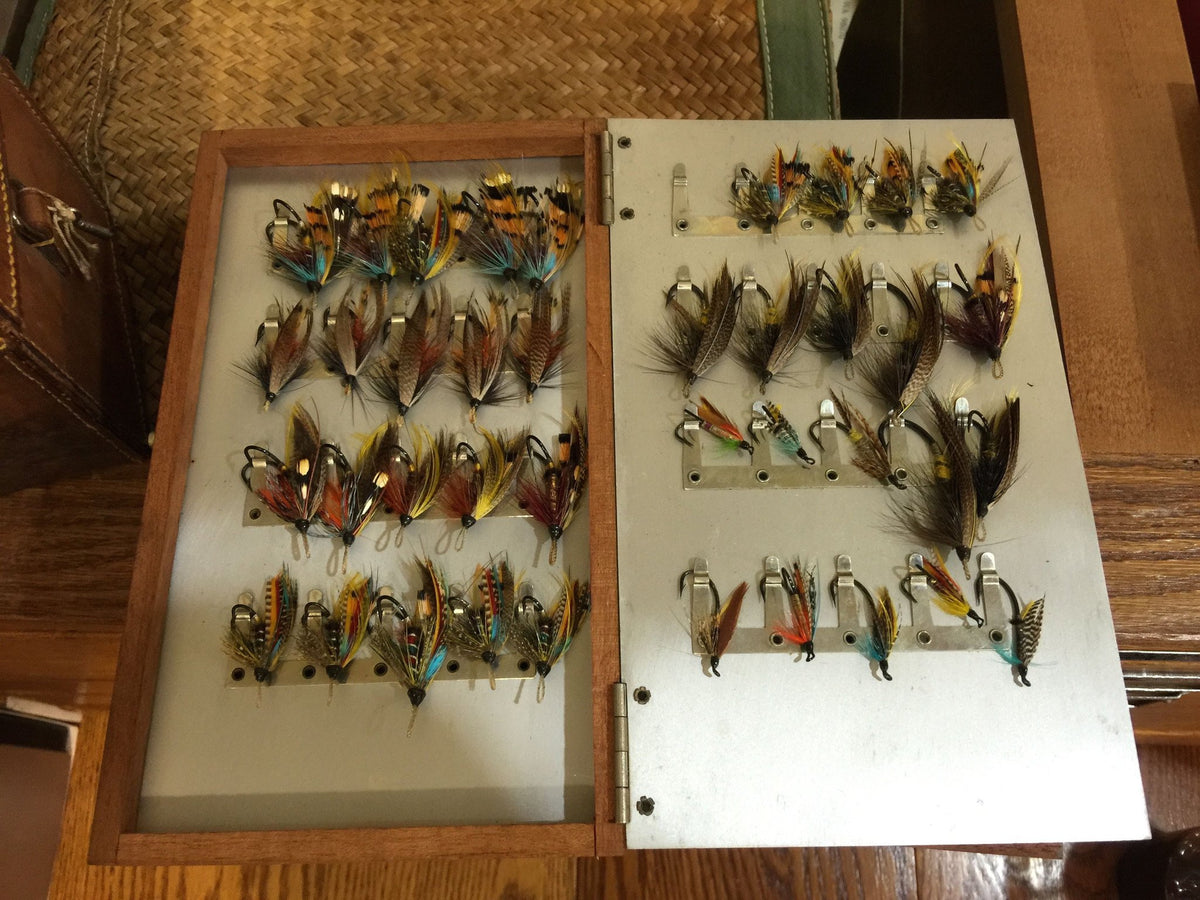 Abercrombie & Fitch leather salmon fly case with 150 unused salmon flies 